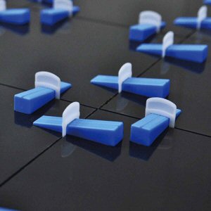 Tiling tools accessories: wedge levelling tile spacers